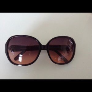 Tory Burch sunglasses.